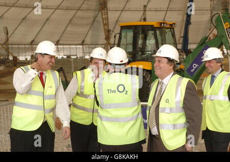 Deputy Prime Minister John Prescott (2nd R) laughs as he visits the construction site of 'The O2', formerly known as the Millennium Dome. Stock Photo