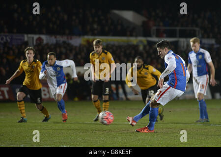 Blackburn Rovers' Ben Marshall scores the opening goal from the penalty spot during the Emirates FA Cup, third round match at Rodney Parade, Newport. Stock Photo