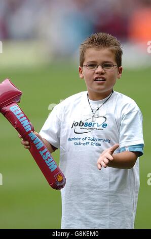 Soccer - FA Barclays Premiership - West Ham United v Blackburn Rovers - Upton Park. A young West Ham United fan cheers as his team come onto the pitch Stock Photo