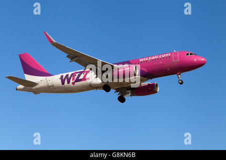 A Wizz Air Airbus A320-200 approaching to El Prat Airport in Barcelona, Spain. Stock Photo