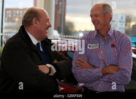 Chairman of the Rugby Football League Brian Barwick (left) talks with New England and current Brisbane Broncos Rugby League coach Wayne Bennett during the launch of the 2016 Dacia World Club Series at Renault Manchester. Stock Photo