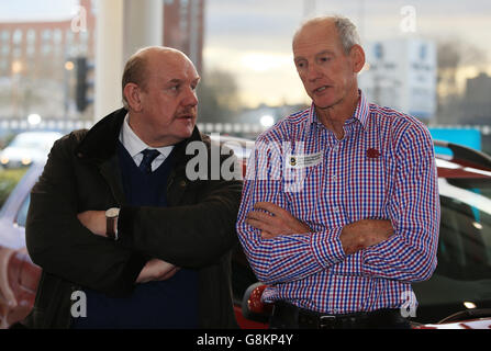 Chairman of the Rugby Football League Brian Barwick (left) talks with New England and current Brisbane Broncos Rugby League coach Wayne Bennett during the launch of the 2016 Dacia World Club Series at Renault Manchester. Stock Photo