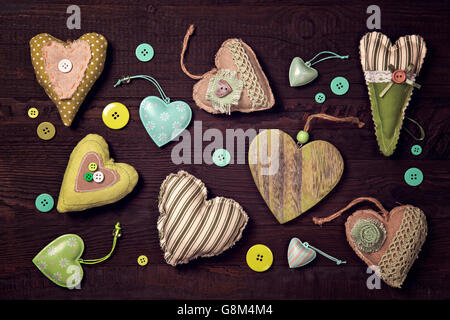 Hearts on a wooden background Stock Photo