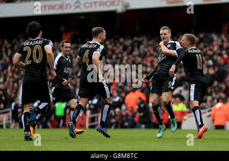 Leicester City's Jamie Vardy (second right) celebrates scoring his side's first goal of the game with team-mate Leicester City's Marc Albrighton (right) Stock Photo