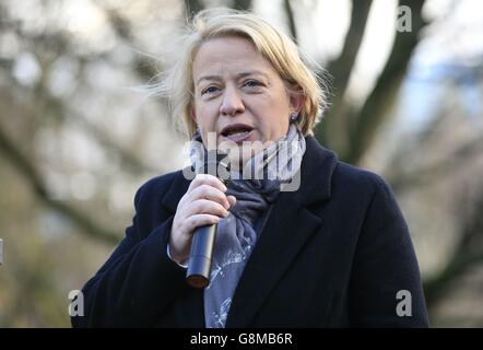Green Party leader Natalie Bennett speaks to protestors as they gather at the Imperial War Museum in London to demonstrate against the Government's Housing and Planning Bill. Stock Photo