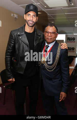 Rio Ferdinand, Founder and Trustee of the Rio Ferdinand Foundation speaks Mayor of Lamberth, Cllr Donatus Anyanwu during a visit to the Foundation's training and youth programmes at the Kia Oval, London. Stock Photo