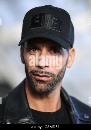 Rio Ferdinand, Founder and Trustee of the Rio Ferdinand Foundation speaks with young people during a visit to one of the Foundation's training and youth programmes at the Kia Oval, London. Stock Photo