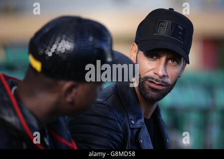 Rio Ferdinand, Founder and Trustee of the Rio Ferdinand Foundation speaks with young people during a visit to one of the Foundation's training and youth programmes at the Kia Oval, London. Stock Photo