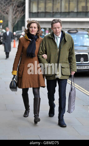 George Bingham, the only son of missing peer Lord Lucan, arriving at the High Court in London with wife Anne-Sofie Foghsgaard, where he is applying for a death certificate so he can inherit the title as 8th Earl. Stock Photo