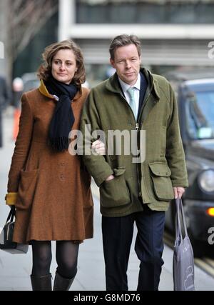 George Bingham, the only son of missing peer Lord Lucan, arriving at the High Court in London with wife Anne-Sofie Foghsgaard, where he is applying for a death certificate so he can inherit the title as 8th Earl. Stock Photo