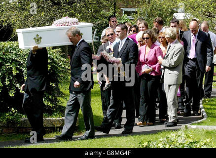 Pippa Livingston-Nurse (centre, pink top) is comforted by family, Thursday 25 August 2005, at the funeral of her three-year-old daughter Abbie Livingston-Nurse, at St. Mary's Church in Goring-by-Sea, Worthing in West Sussex. Abbie Livingstone-Nurse suffocated in the sand at Towans Beach near Hayle, Cornwall, on August 14 after she fell into the hole with her five-year-old brother Joe. See PA Story FUNERAL Abbie. PRESS ASSOCIATION photo. Photo Credit should read: Gareth Fuller /PA Stock Photo