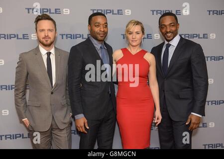 (Left to right) Aaron Paul, Chiwetel Ejiofor, Kate Winslet and Anthony Mackie attend the UK gala screening of Triple 9 at the Ham Yard Hotel in London. Stock Photo