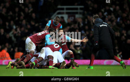 West Ham United v Liverpool - Emirates FA Cup - Fourth Round Replay - Upton Park. West Ham United players score their second goal during the Emirates FA Cup, fourth round replay match at Upton Park, London. Stock Photo