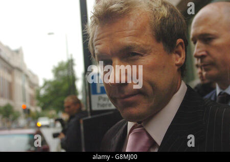 Former Coronation Street actor Christopher Quentin (centre) leaves Horseferry Road Magistrates Court in central London. Mr Quentin, who played the character Brian Tilsley before his departure from the show in 1989, is accused of raping a woman in her twenties in a London nightclub earlier this year. Stock Photo