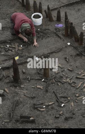 Archaeologists work on the site of a Bronze Age settlement destroyed in ...