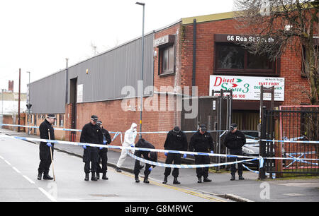 Man shot dead in warehouse robbery bid Stock Photo