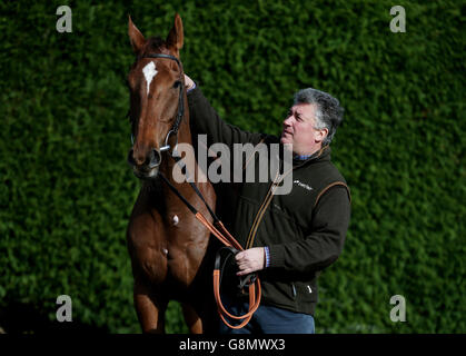 Paul Nicholls Stable Visit - Manor Farm Stables. Trainer Paul Nicholls with Silviniaco Conti during a stable visit to Manor Farm Stables, Ditcheat. Stock Photo