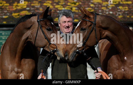 Paul Nicholls Stable Visit - Manor Farm Stables. Trainer Paul Nicholls with Dodging Bullets (left) and Silviniaco Conti (right) during a stable visit to Manor Farm Stables, Ditcheat. Stock Photo