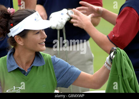 Catherine Zeta Jones prepares for the start of the All Star Cup celebrity golf tournament on Saturday 27 August 2005, which is being held at the Celtic Manor Resort near Newport, Wales. Jodie Kidd, Rob Lowe, Chris Evans and Gavin Henson are among the celebrities making up the two teams to be pitted against each other during the two-day event See PA story SHOWBIZ Golf. PRESS ASSOCIATION Photo. Photo credit should read: Steve Parsons/PA Stock Photo