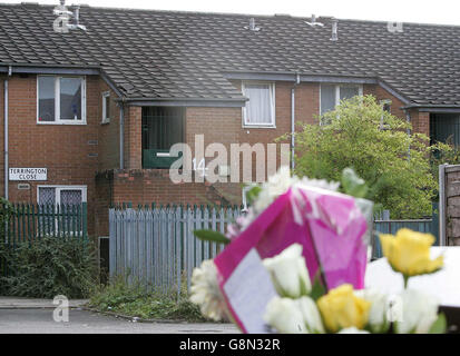 flowers are left at Terrington Close, Chorlton where a six-year-old boy was found by his father murdered in his bedroom, police said, Thursday 1 September 2005. The schoolboy had been left with a 'family friend' when his father returned home at around 8.30am today and made the grim discovery. Police were called to the scene and a 25-year-old man, not the boy's father, was arrested at a nearby cafe. See PA Story POLICE Boy. PRESS ASSOCIATION Photo. Photo credit should read: Martin Rickett/PA Stock Photo