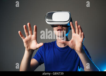 Young man using a VR googles. Stock Photo