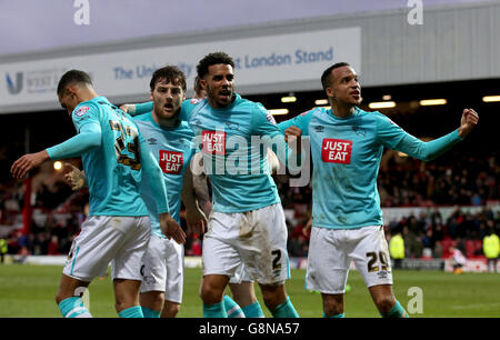 Derby County's Chris Martin (left) celebrates scoring his side's third goal of the game alongside teammates Cyrus Christie (centre) and Marcus Olsson (right) Stock Photo