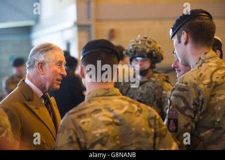 The Prince of Wales talks to soldiers during his visit to the 1st Queens Dragoon Guards at the new barracks in Norfolk. Stock Photo