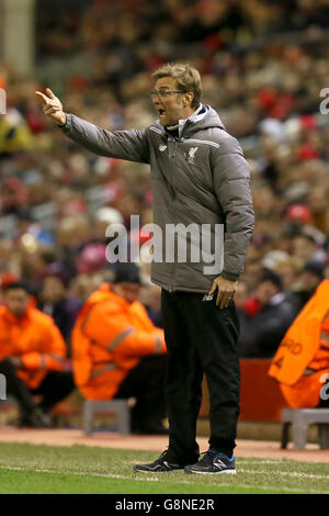 Liverpool v FC Augsburg - UEFA Europa League - Round of 32 - Second Leg - Anfield. Liverpool manager Jurgen Klopp gestures on the touchline during the UEFA Europa League match at Anfield, Liverpool. Stock Photo