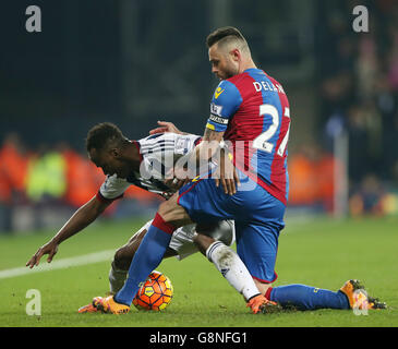 West Bromwich Albion's Saido Berahino (left) and Crystal Palace's Damien Delaney battle for the ball during the Barclays Premier League match at The Hawthorns, West Bromwich.