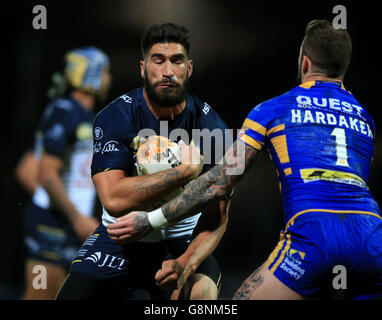 North Queensland Cowboys James Tamou (left) and Leeds Rhinos Zak Hardaker during the World Club Series match at Headingley Stadium, Leeds. Stock Photo