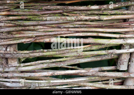 Woven wooden hurdle full frame close up background Stock Photo