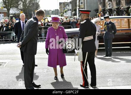 Queen Elizabeth II arrives at the Lister Community School in London, to discover more about how The Queen's Trust is supporting the work of various charities in schools. Stock Photo