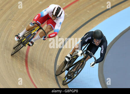 New Zealand's Sam Webster (right) and Russia's Denis Dmitriev compete in the Men's Sprint during day three of the UCI Track Cycling World Championships at Lee Valley VeloPark, London. PRESS ASSOCIATION Photo. Picture date: Friday March 4, 2016. See PA story CYCLING World. Photo credit should read: Tim Goode/PA Wire. RESTRICTIONS: , No commercial use without prior permission, please contact PA Images for further information: Tel: +44 (0) 115 8447447. Stock Photo