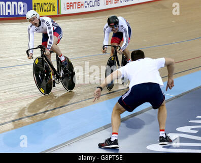 Great Britain's Jason Kenny (left) reacts alongside teammate Callum Skinner during the Men's Team Sprint during day one of the UCI Track Cycling World Championships at Lee Valley VeloPark, London. Stock Photo