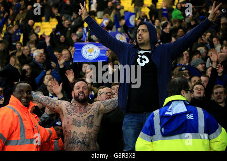 Leicester City fans celebrate in the stands during the Barclays Premier League match at Vicarage Road, London. PRESS ASSOCIATION Photo. Picture date: Saturday March 5, 2016. See PA story SOCCER Watford. Photo credit should read: Nick Potts/PA Wire. Stock Photo