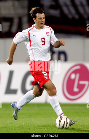 Soccer - FIFA World Cup 2006 Qualifier - Group Six - Poland v Wales - Wojska Polskiego Stadium. Maciej Zurawski, Poland Stock Photo