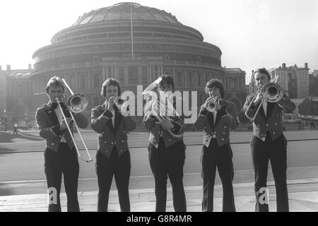 Starting off on the right note at the Royal Albert Hall, London, are these members of the Ever Ready Brass Band, from Durham. (l-r) Ian Carling (trompone), Bryan Tait (trumpet), Nicholas Childs (euphonium), Michael Lumsdon (trumpet) and Ian Haigh ( trombone), who were tuning-up for their first public appearance with the band in the finals of the National Brass Band Championships. Stock Photo