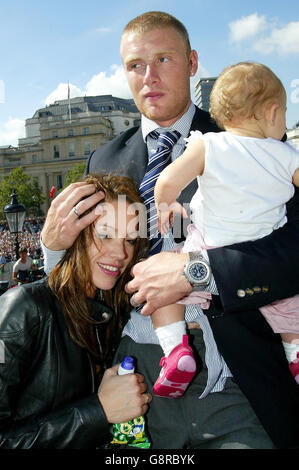 England cricketer Andrew Flintoff (C) with his wife Rachael and year old daughter Holly in Trafalgar Square, London, Tuesday September 13, 2005. England regained the Ashes yesterday after drawing the final Test match and winning the series 2-1. PRESS ASSOCIATION Photo. Photo credit should read: Gareth Copley/PA. Stock Photo