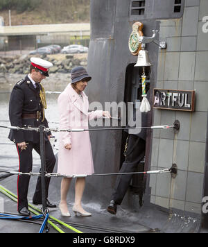 Sponsor Lady Zambellas, who had named HMS Artful in Barrow-in-Furness in 2014, goes aboard the submarine following the commissioning ceremony at Faslane naval base on the Clyde when the 7,400-tonne nuclear-powered sub officially joined the Royal Navy fleet. Stock Photo