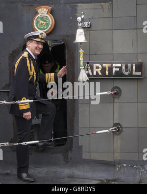 Admiral Sir George Zambellas, the First Sea Lord and Chief of the Naval Staff, following the commissioning ceremony at Faslane naval base on the Clyde when the 7,400-tonne nuclear-powered submarine HMS Artful officially joined the Royal Navy fleet. Stock Photo