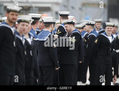 Submariners ahead of a commissioning ceremony at Faslane naval base on the Clyde where the 7,400-tonne nuclear-powered submarine officially joined the Royal Navy fleet. Stock Photo