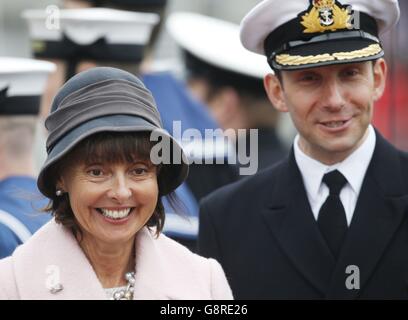 Commander Stuart Armstrong (right) and sponsor Lady Zambellas (left) who named HMS Artful at her launch in Barrow in Furness in 2014, during a commissioning ceremony at Faslane naval base on the Clyde where the 7,400-tonne nuclear-powered submarine officially joined the Royal Navy fleet. Stock Photo