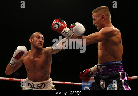 Terry Flanagan (right) and Derry Mathews during the WBO World Lightweight Championship bout at the Liverpool Echo Arena. Stock Photo