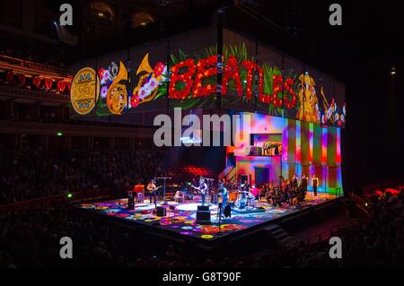 General view of a performance of 'The Sessions', a live re-staging of The Beatles at Abbey Road Studios at the Royal Albert Hall, London. The show is a recreation of the Beatles' recording sessions at the Abbey Road studios with a full 21 piece orchestra. Stock Photo