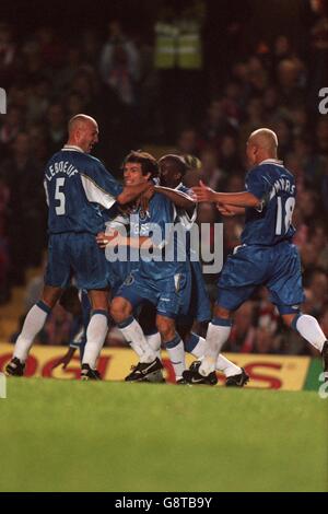 Chelsea's Gianfranco Zola (second left) is congratulated by teammates Frank Leboeuf (left), Frank Sinclair (second right) and Andy Myers (right) Stock Photo