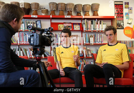 Brownlee Brothers Photocall - Bramhope Primary School. Alistair (right) and Jonny Brownlee are interviewed by Press Association journalist Mark Staniforth at Bramhope Primary School. Stock Photo