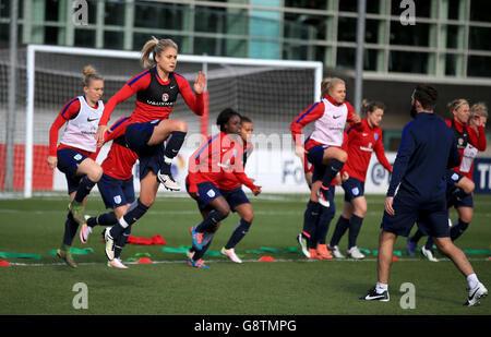 England's Women captain Steph Houghton (centre) leads the warm up during the training session at St George's Park, Burton. Stock Photo