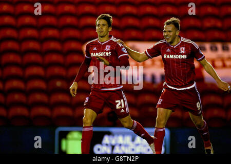 Middlesbrough's Gaston Ramirez (left) celebrates scoring his side's second goal of the game with teammate Jordan Rhodes during the Sky Bet Championship match at the Riverside Stadium, Middlesbrough. Stock Photo