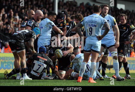 Exeter Chiefs' Thomas Waldrom (centre) is congratulated by his team mates after he goes over to score his third and their side's seventh try during the Aviva Premiership match at Sandy Park, Exeter.