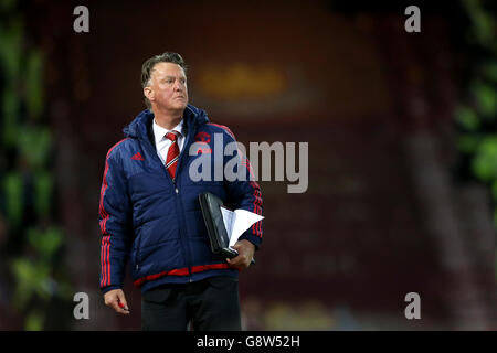 Manchester United manager Louis van Gaal on the touchline during the Emirates FA Cup, Quarter Final Replay match at Upton Park, London. Stock Photo